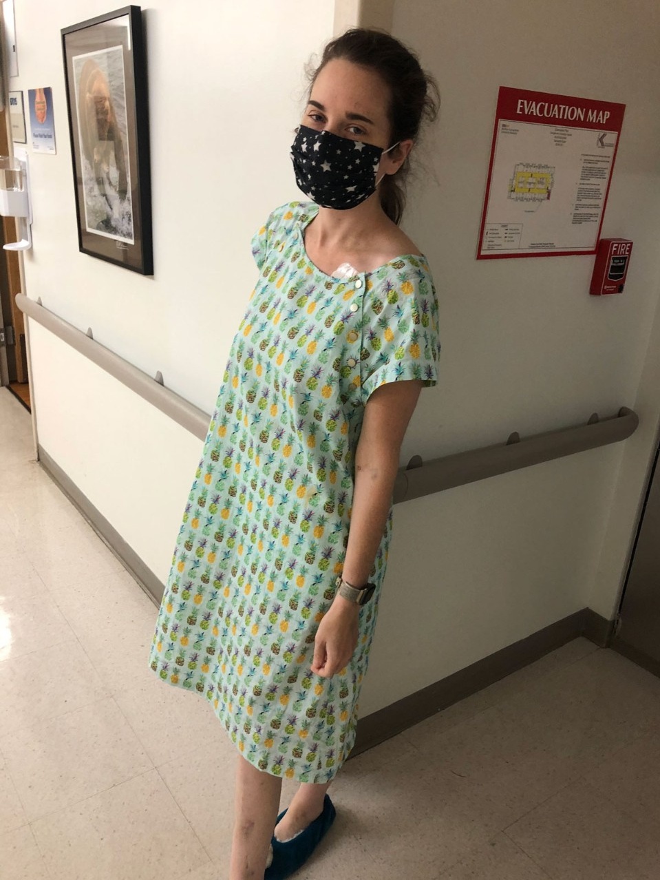 Zoom image: Donnarumma in one of her newest products: a patterned hospital gown that's functional and full of personality. 