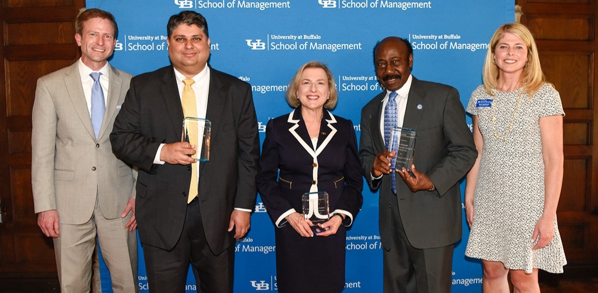Zoom image: From left, Paul Tesluk, dean; Hero Alimchandani, CRC Alumnus of the Year; Ann Cohen and Alex Ampadu, CRC Faculty Members of the Year; and Gwen Appelbaum, assistant dean and director of the Career Resource Center. Photo: Joe Cascio 
