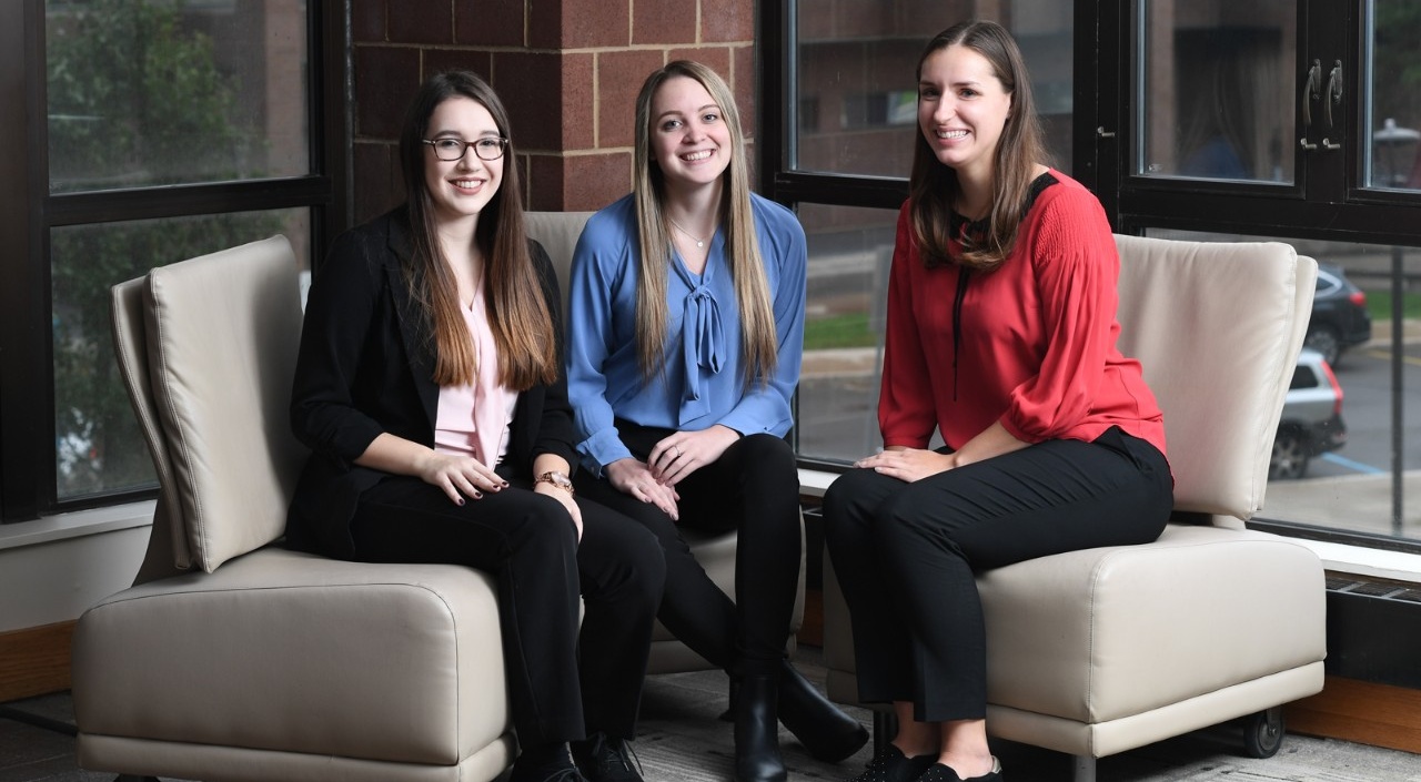 Zoom image: From left, Women in Management e-board members Jenna Behm, Samantha Frank and Gabrielle Lindauer. Photos: Nancy J. Parisi 