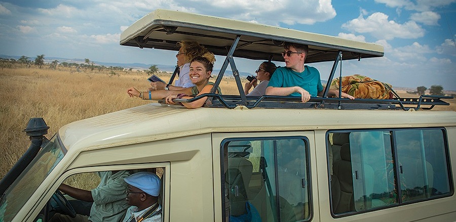 A truck carries students and faculty through Serengeti National Park in Tanzania. 